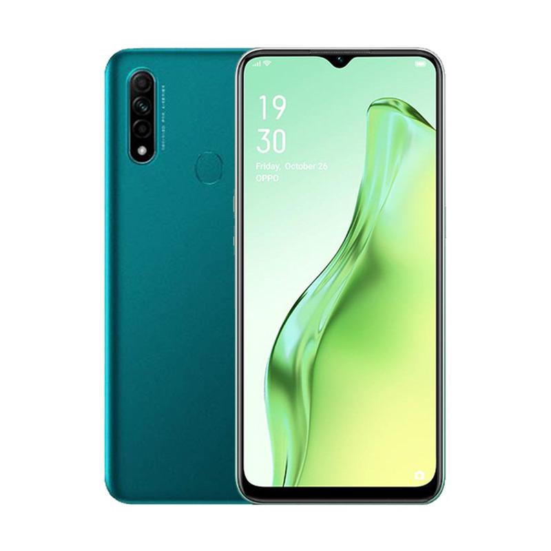 Oppo A31 with a green back casing and triple camera setup, displayed alongside abstract art in the background